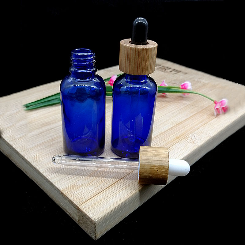 30ml blue essential oil glass dropper bottle with eco-friendly wood grain Glass pipette bamboo cap