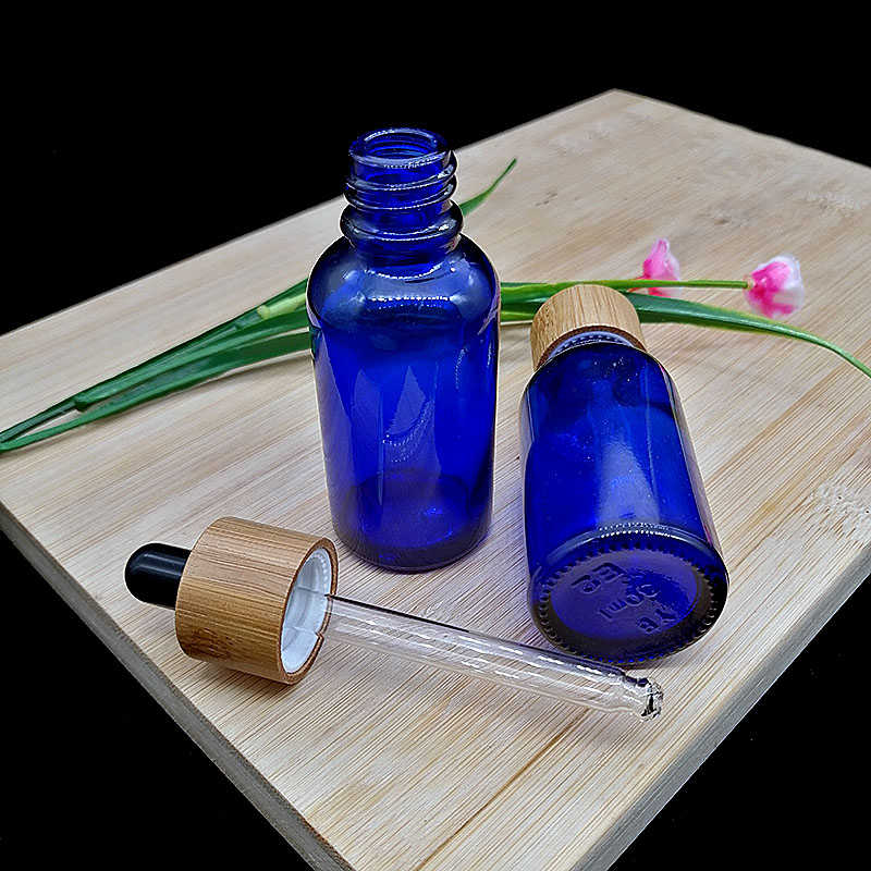 30ml blue essential oil glass dropper bottle with eco-friendly wood grain Glass pipette bamboo cap