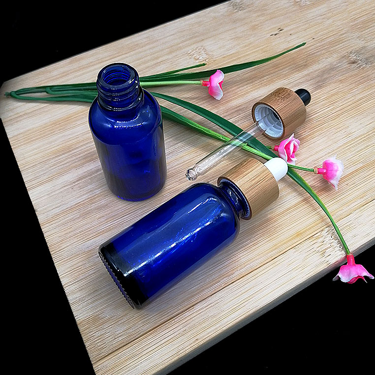 30ml blue essential oil glass dropper bottle with eco-friendly wood grain Glass pipette bamboo cap