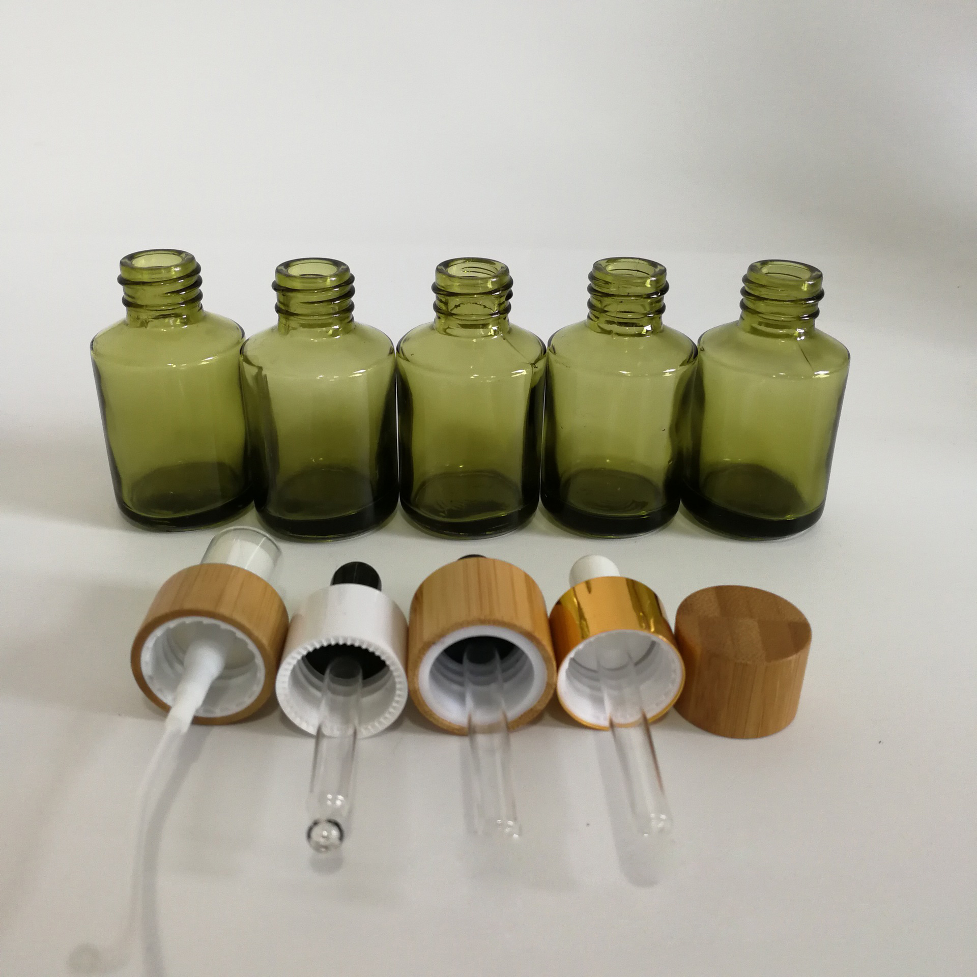 30ml clear Olive green glass slant shoulder CBD oil skincare essential oil dropper bottle with bamboo plastic aluminum lid top