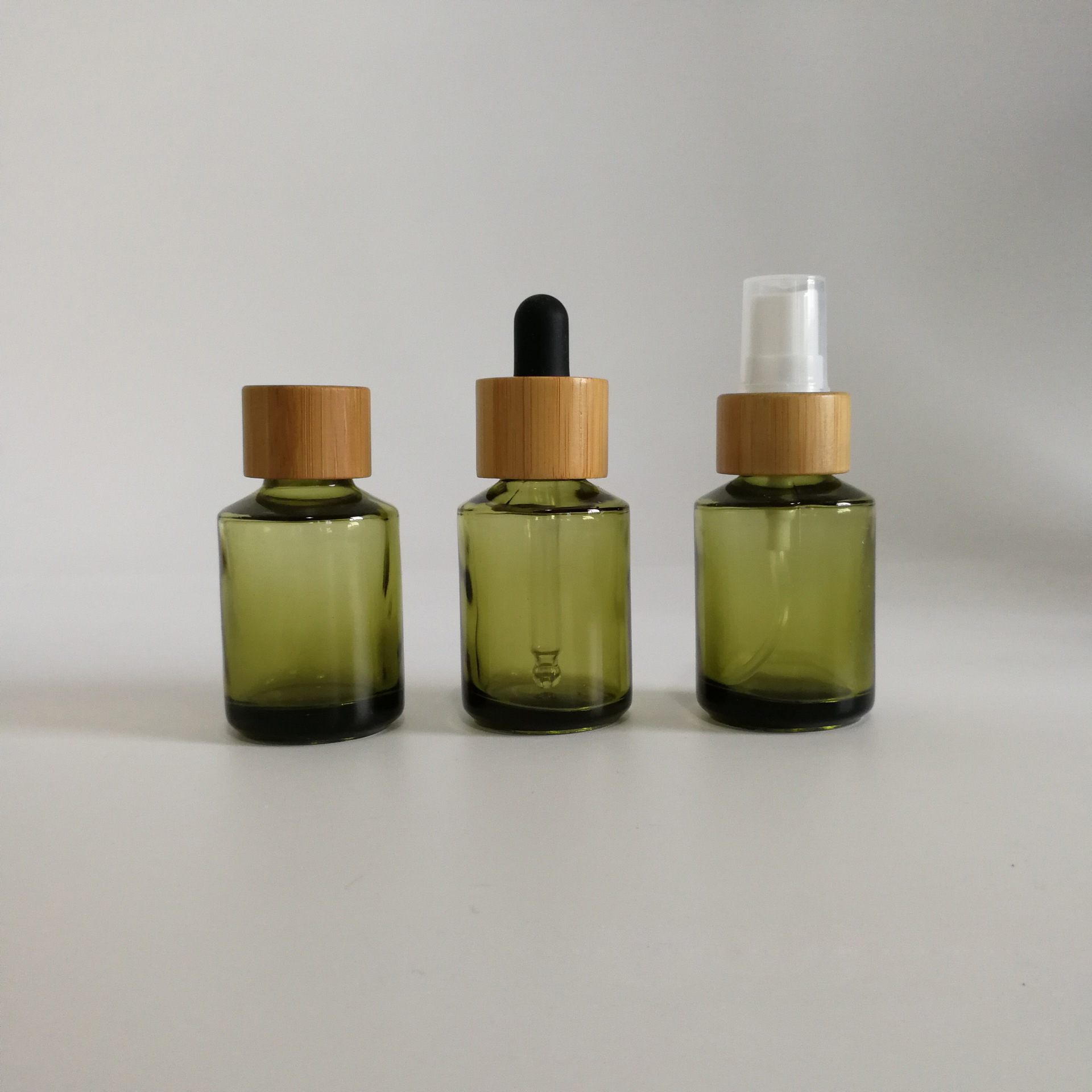 30ml clear Olive green glass slant shoulder CBD oil skincare essential oil dropper bottle with bamboo plastic aluminum lid top