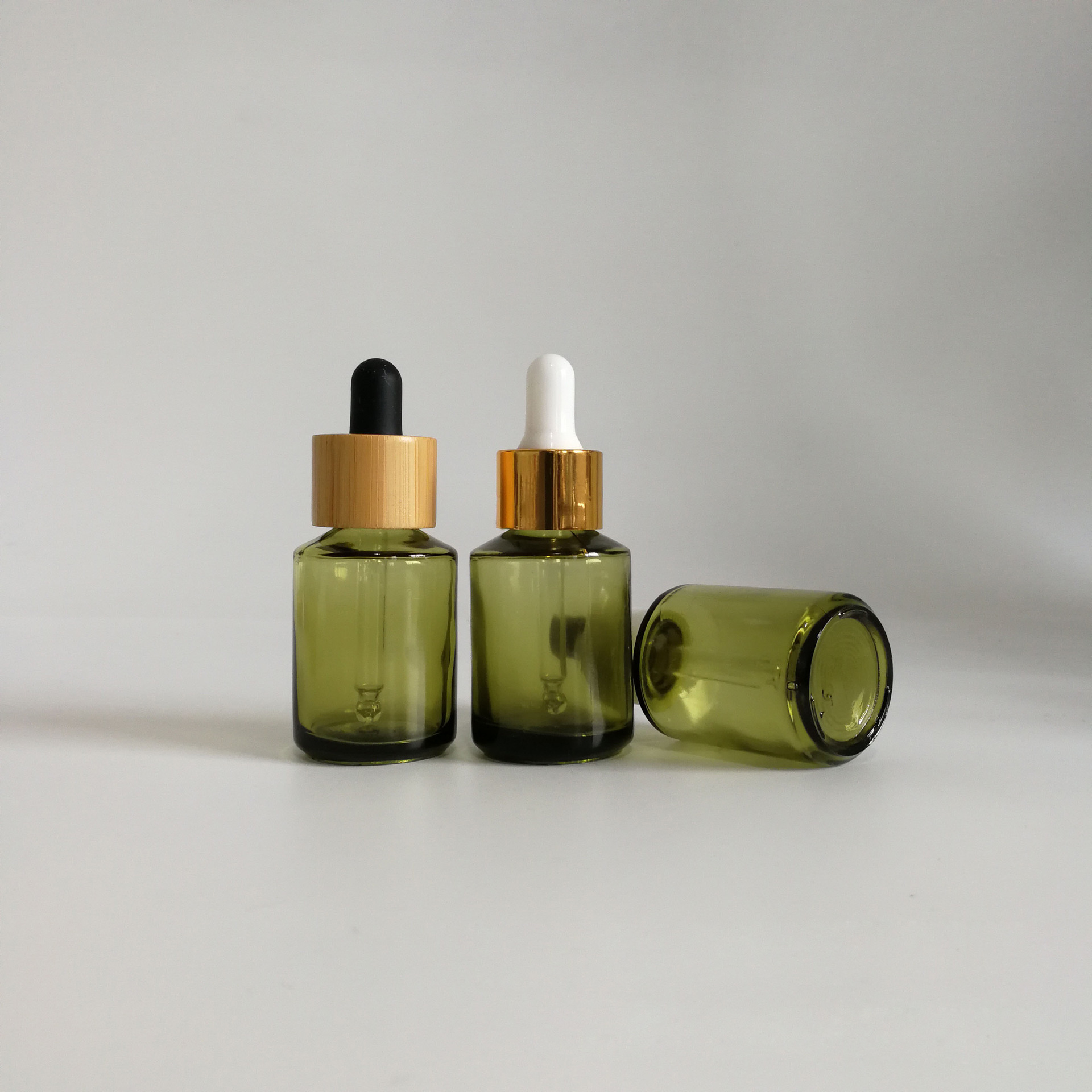 30ml clear Olive green glass slant shoulder CBD oil skincare essential oil dropper bottle with bamboo plastic aluminum lid top