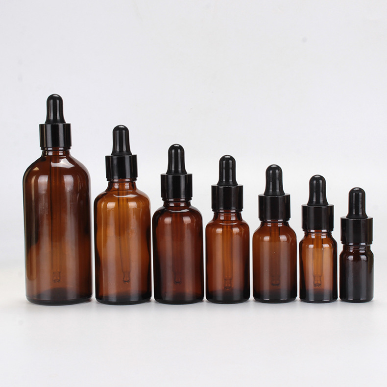 30ml clear amber glass dropper bottle with glossy black dropper for cosmetics