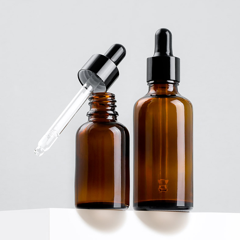 30ml clear amber glass dropper bottle with glossy black dropper for cosmetics