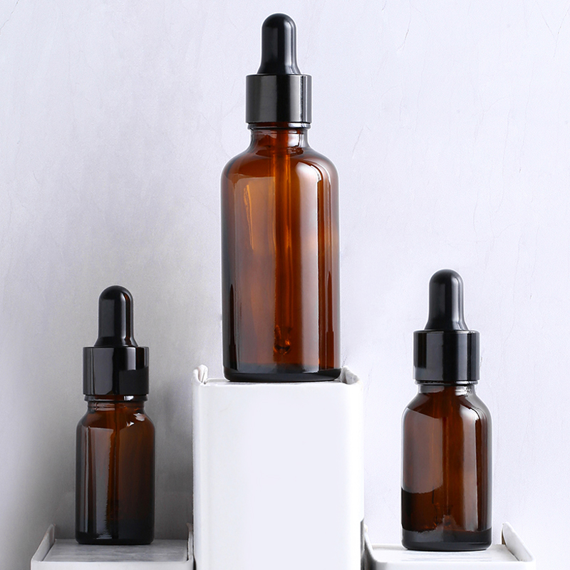 30ml clear amber glass dropper bottle with glossy black dropper for cosmetics