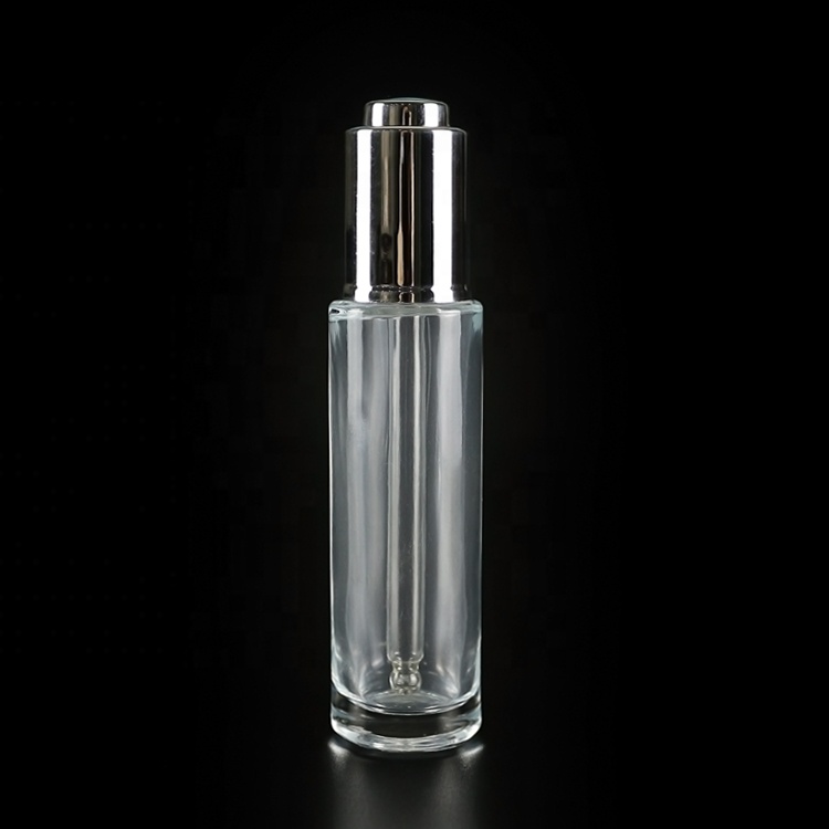 30ml clear glass push button dropper bottle with silver plastic screw cap
