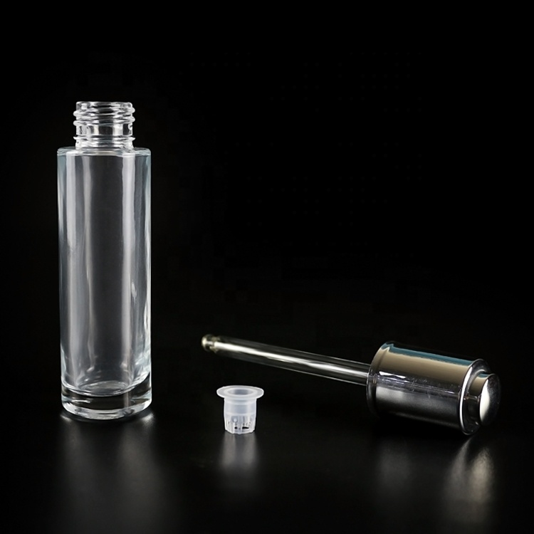 30ml clear glass push button dropper bottle with silver plastic screw cap