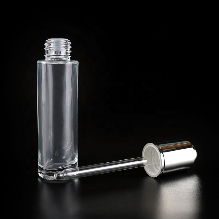 30ml clear glass push button dropper bottle with silver plastic screw cap