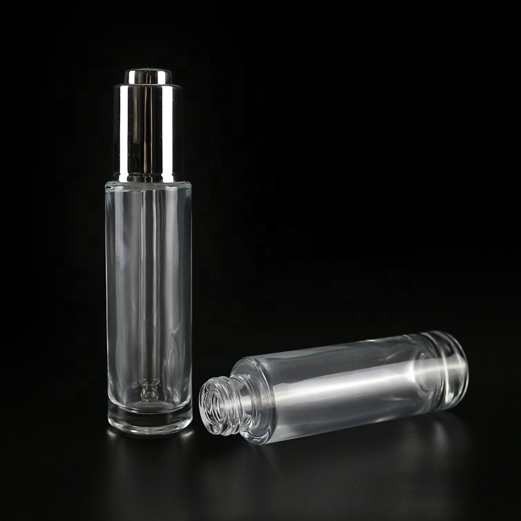 30ml clear glass push button dropper bottle with silver plastic screw cap