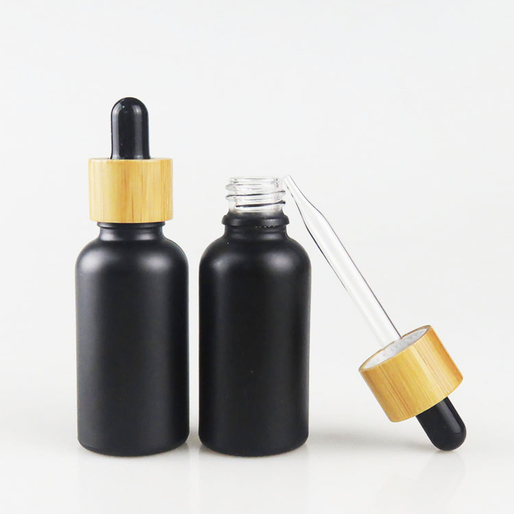 30ml glass bottle with dropper 1oz black frosted liquid dropper bottle with bamboo cap