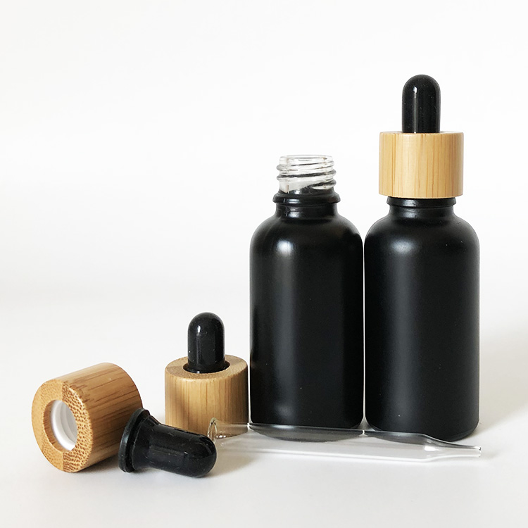 30ml glass bottle with dropper 1oz black frosted liquid dropper bottle with bamboo cap