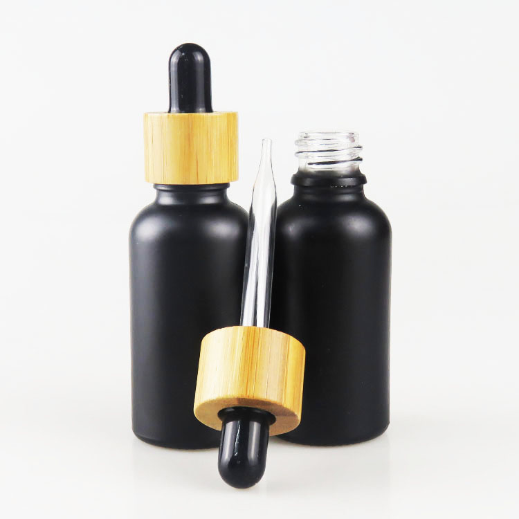 30ml glass bottle with dropper 1oz black frosted liquid dropper bottle with bamboo cap