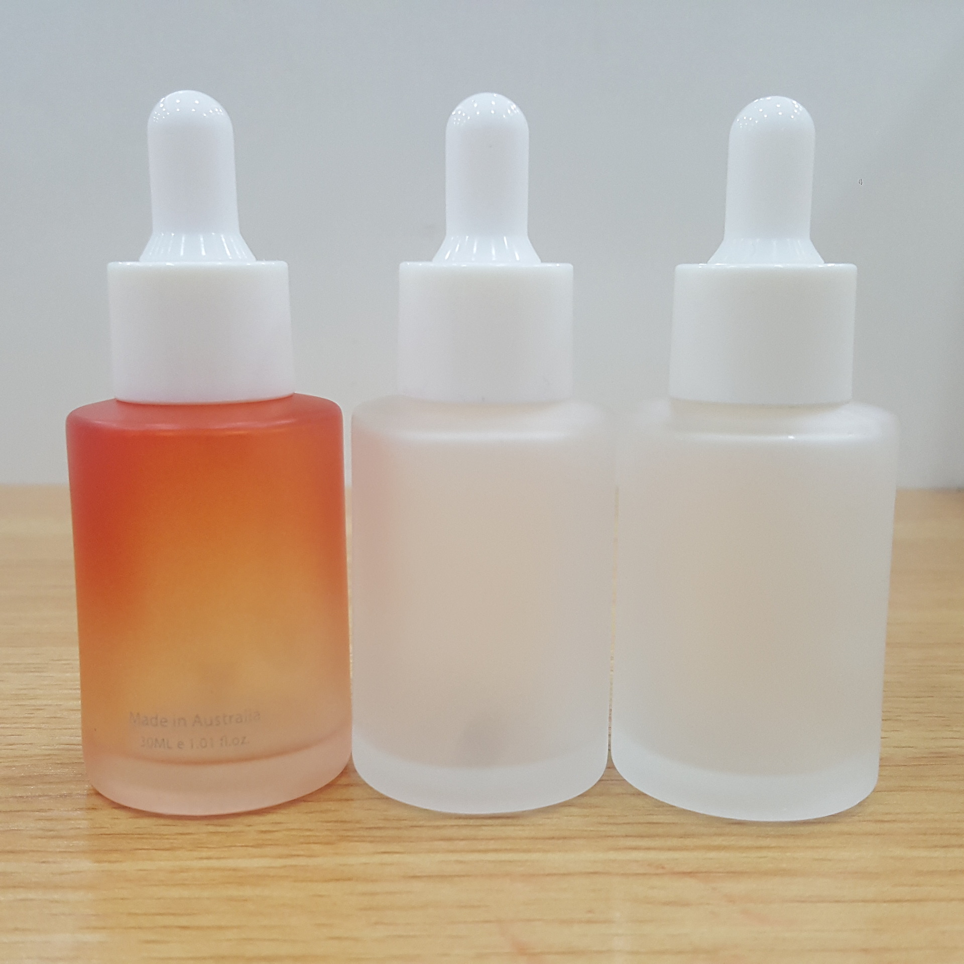 30ml glass cosmetic Flat shoulder frosted clear dropper bottle matte Orange gradient essential oil bottle with white dropper