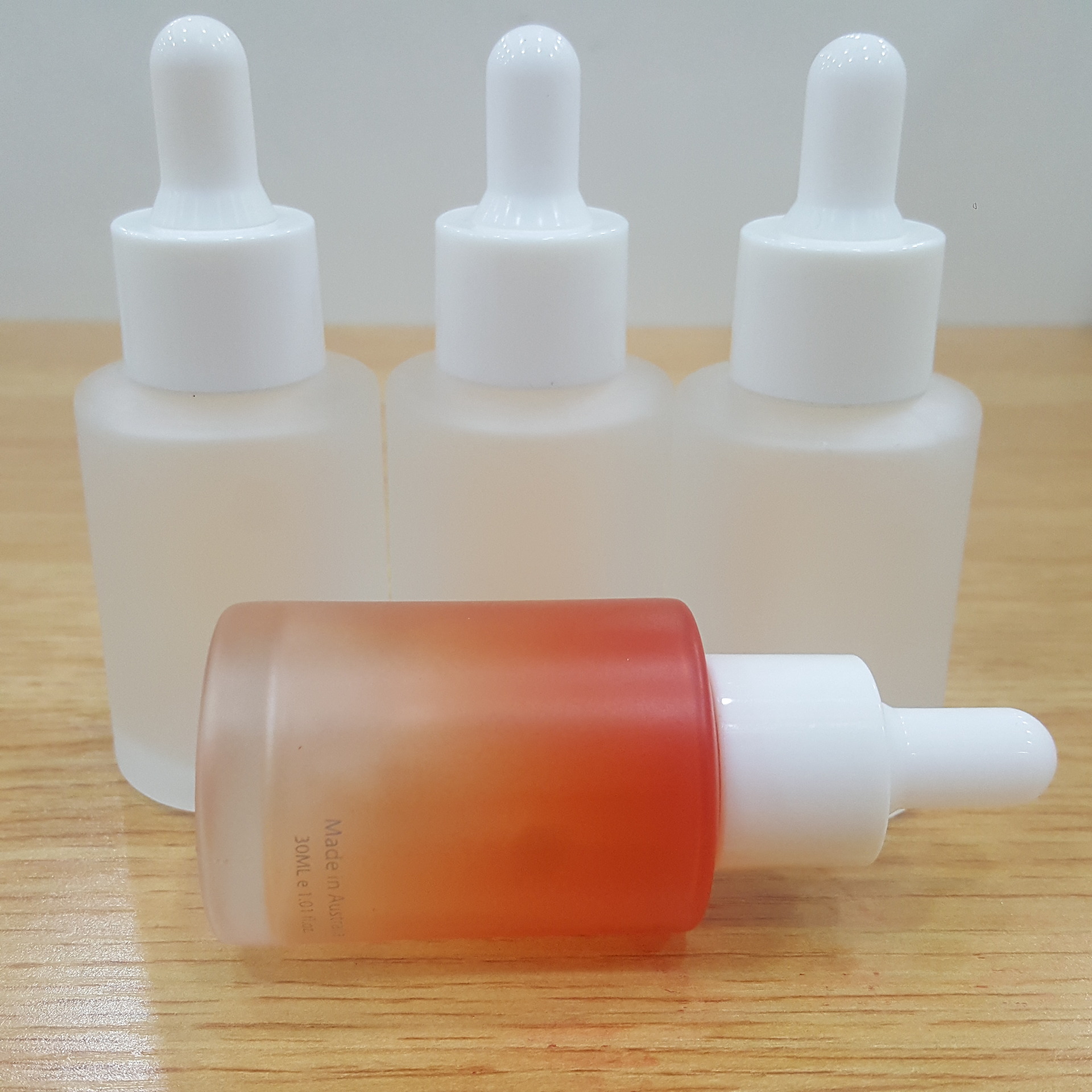 30ml glass cosmetic Flat shoulder frosted clear dropper bottle matte Orange gradient essential oil bottle with white dropper