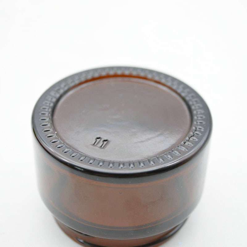 30ml glass empty amber cosmetic jar with silver lid