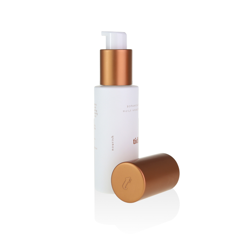 30ml glass serum bottles with copper pump embossed logo cap