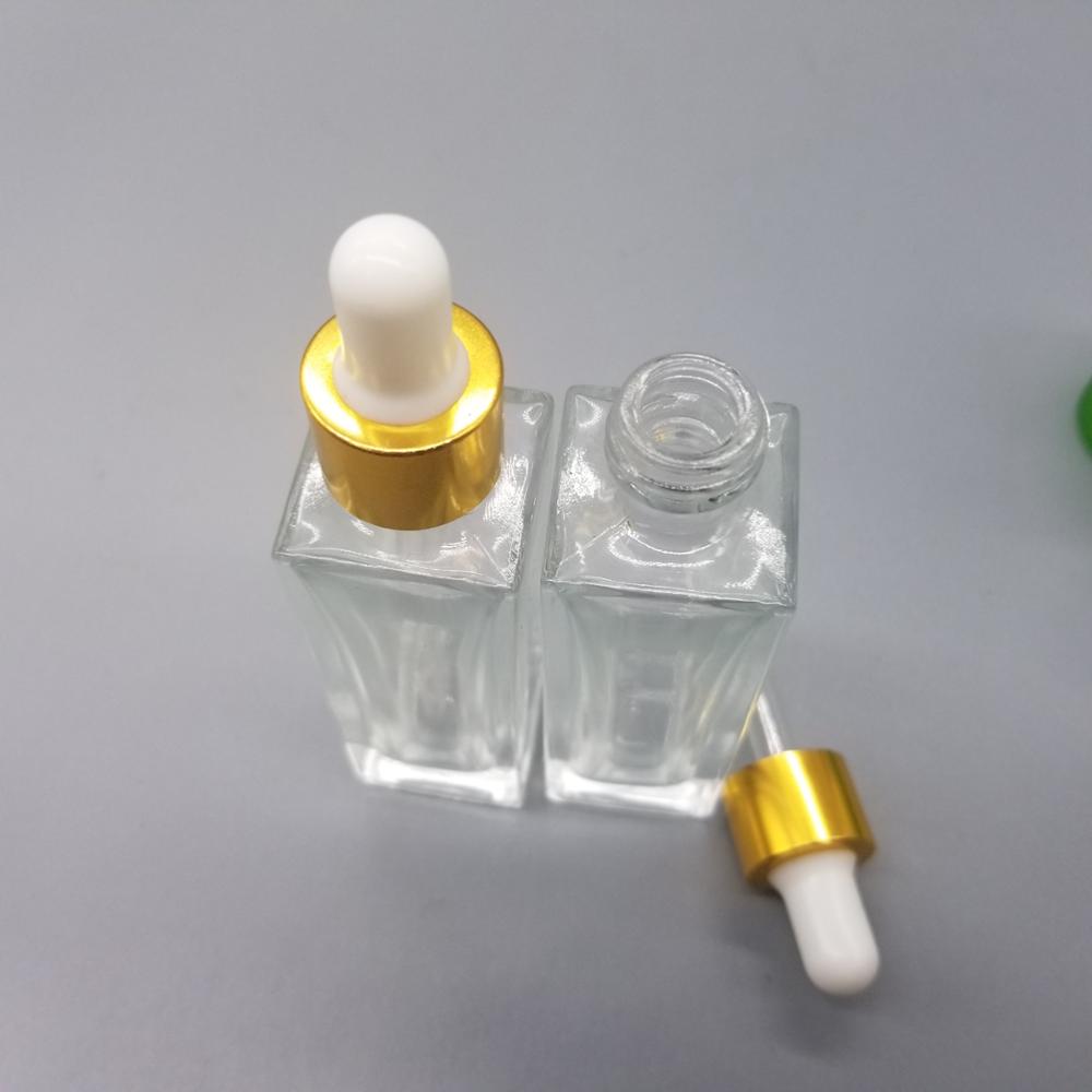 30ml hot sale square essential oil bottle with golden alumina dropper