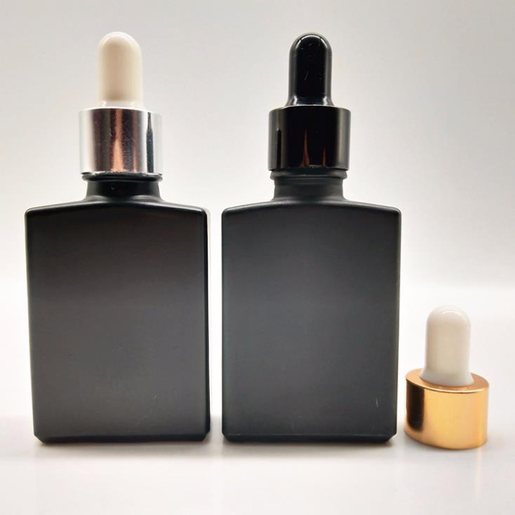 30ml rectangle glass dropper bottle frost black glass dropper bottles wholesale bamboo lid bottle