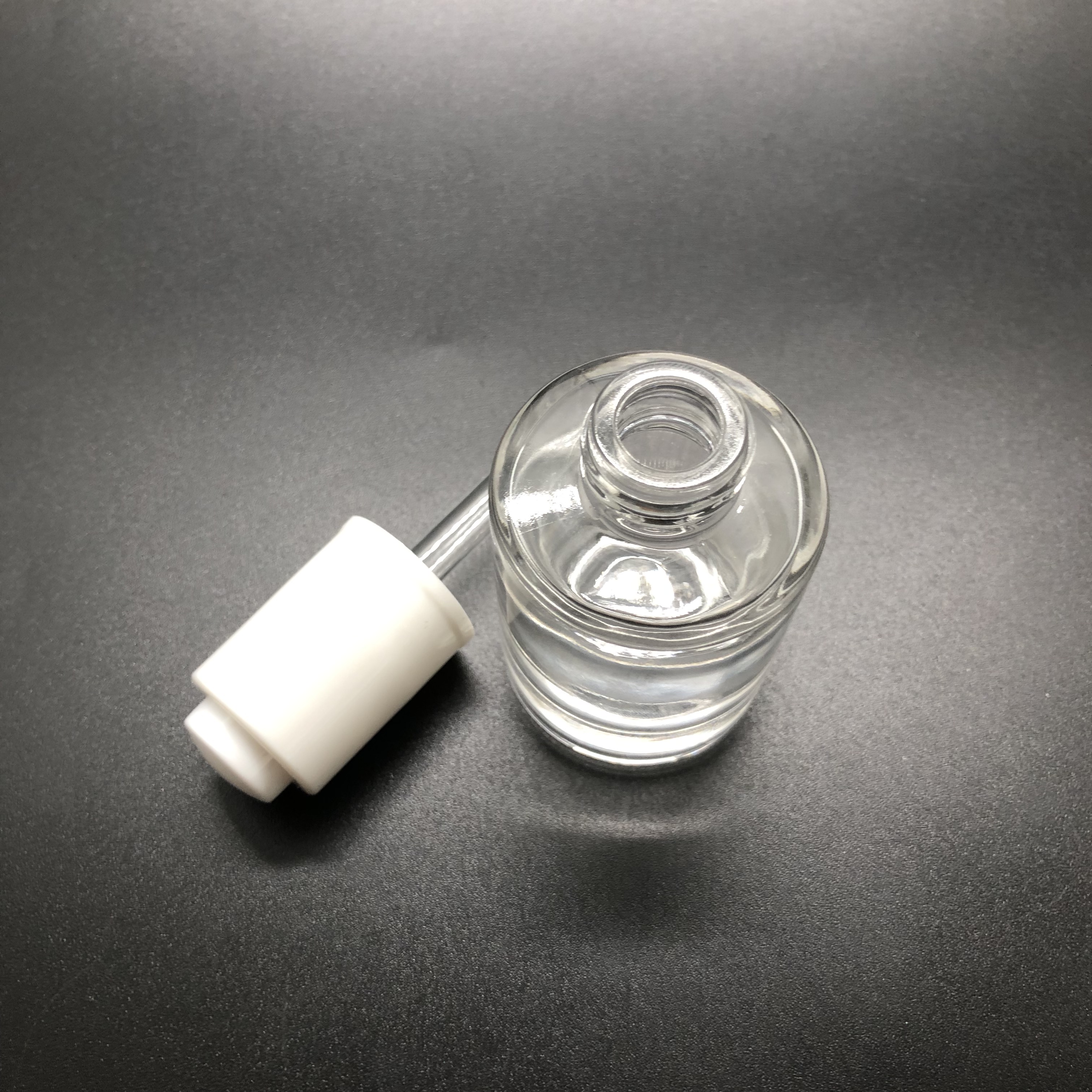 30ml thick bottom serum clear round glass bottle with white push button dropper
