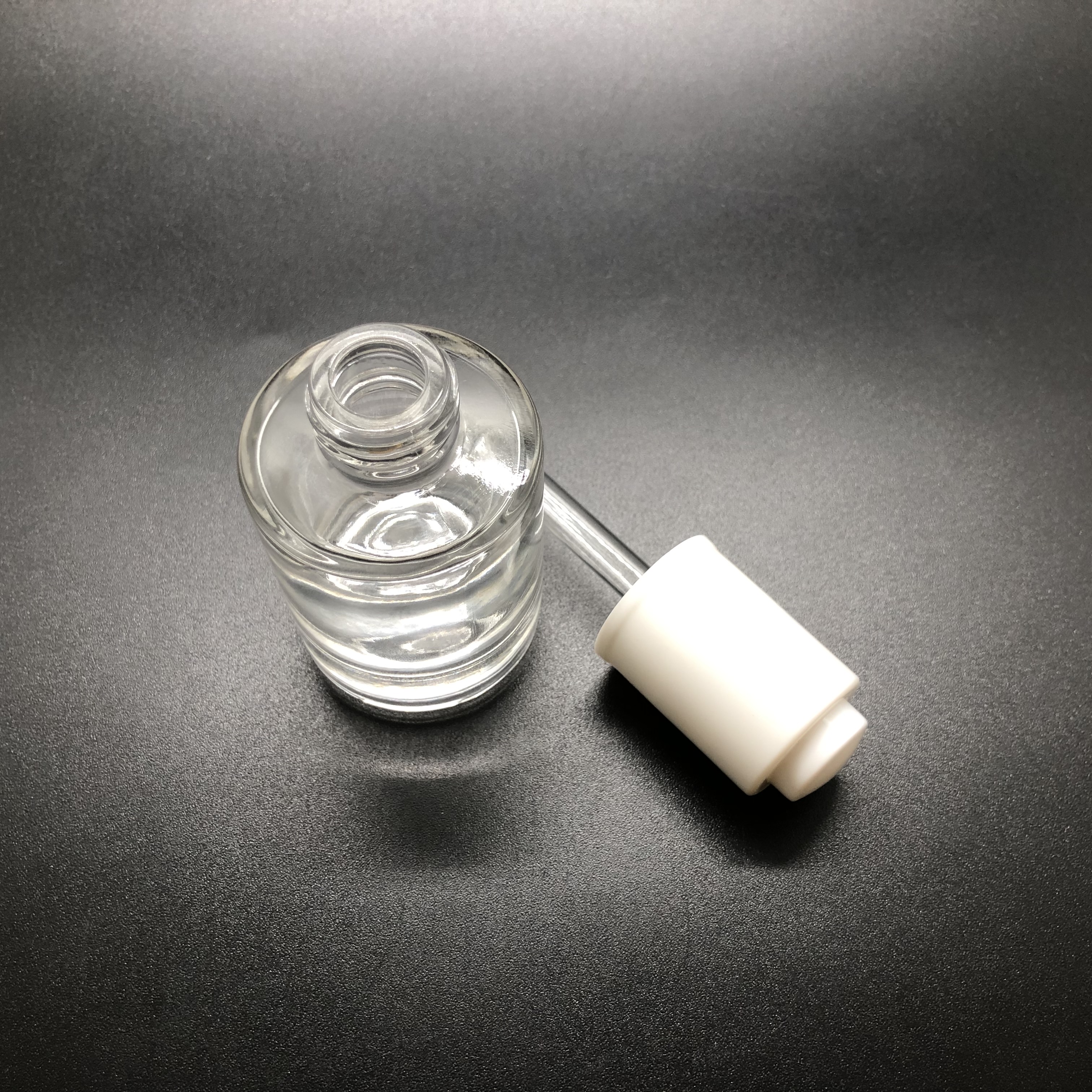 30ml thick bottom serum clear round glass bottle with white push button dropper