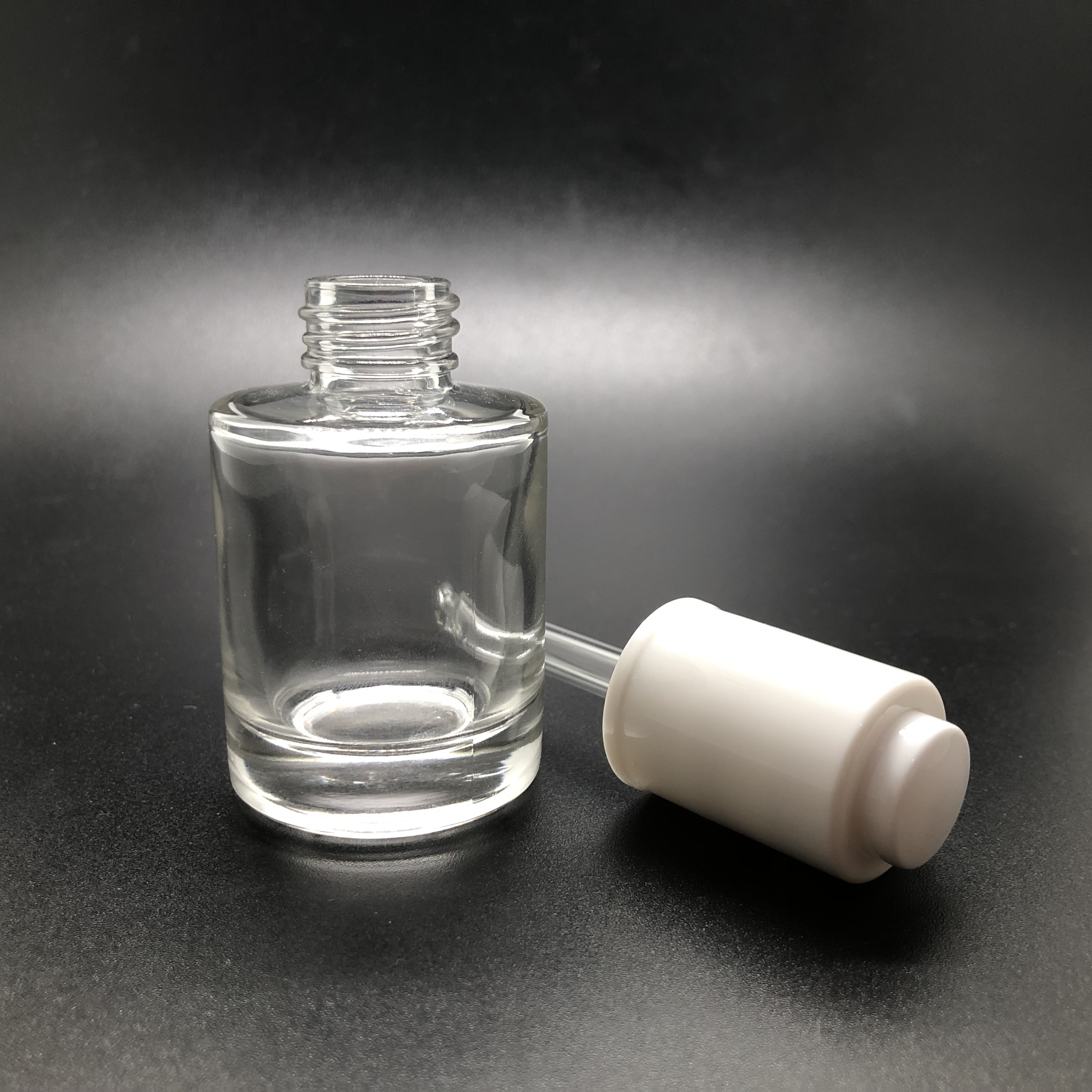 30ml thick bottom serum clear round glass bottle with white push button dropper
