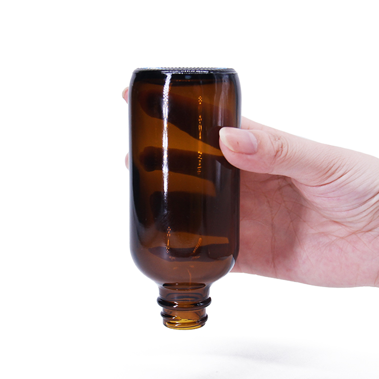 32oz Boston Round Clear Glass Growler with Phenolic Poly Cone Insert Caps