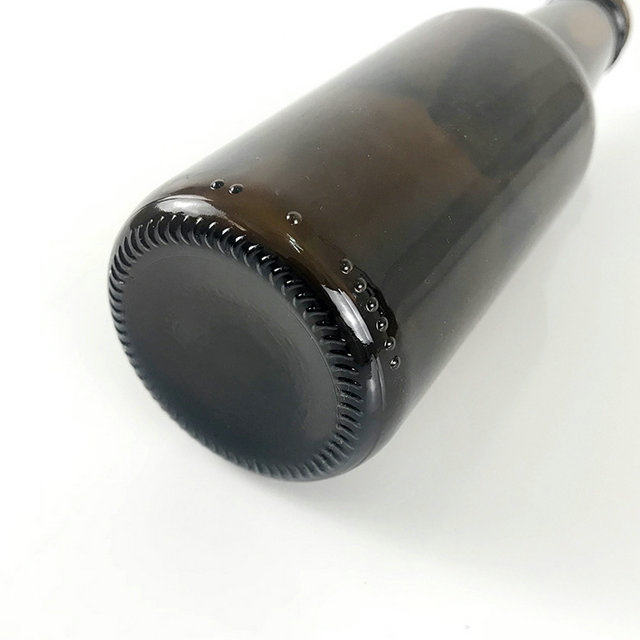 33cl 330ml empty brown glass beer bottle with crown cap