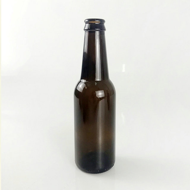 33cl 330ml empty brown glass beer bottle with crown cap