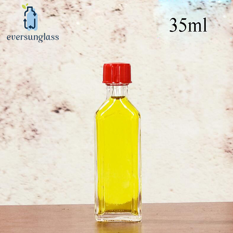 35ml Wholesale Custom Wholesale Clear Flat Safflower Oil Glass Bottle Essential Oil Bottle with Plastic Screw Lid for Liquor and