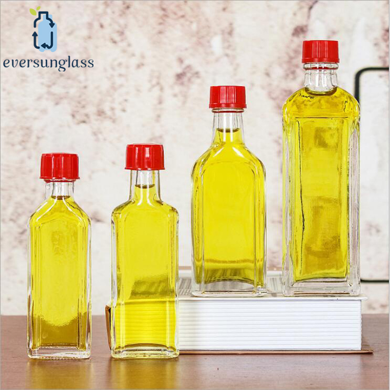 35ml Wholesale Custom Wholesale Clear Flat Safflower Oil Glass Bottle Essential Oil Bottle with Plastic Screw Lid for Liquor and