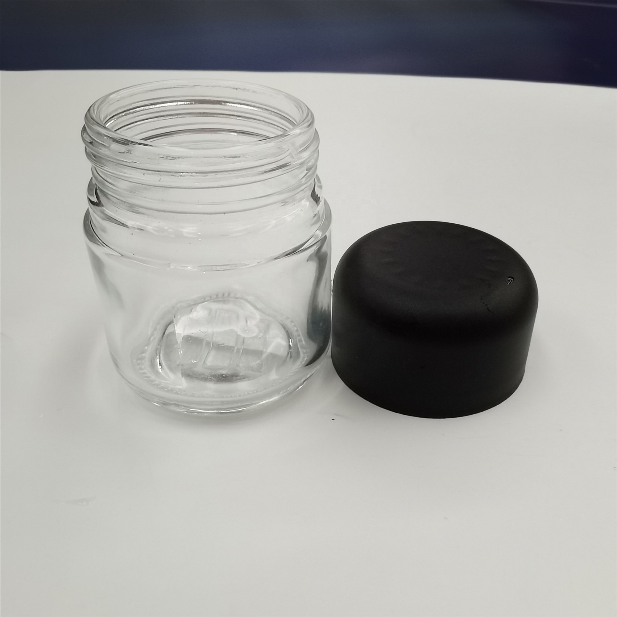 3OZ childproof glass jar with child resistant cap for packaging weed flowers