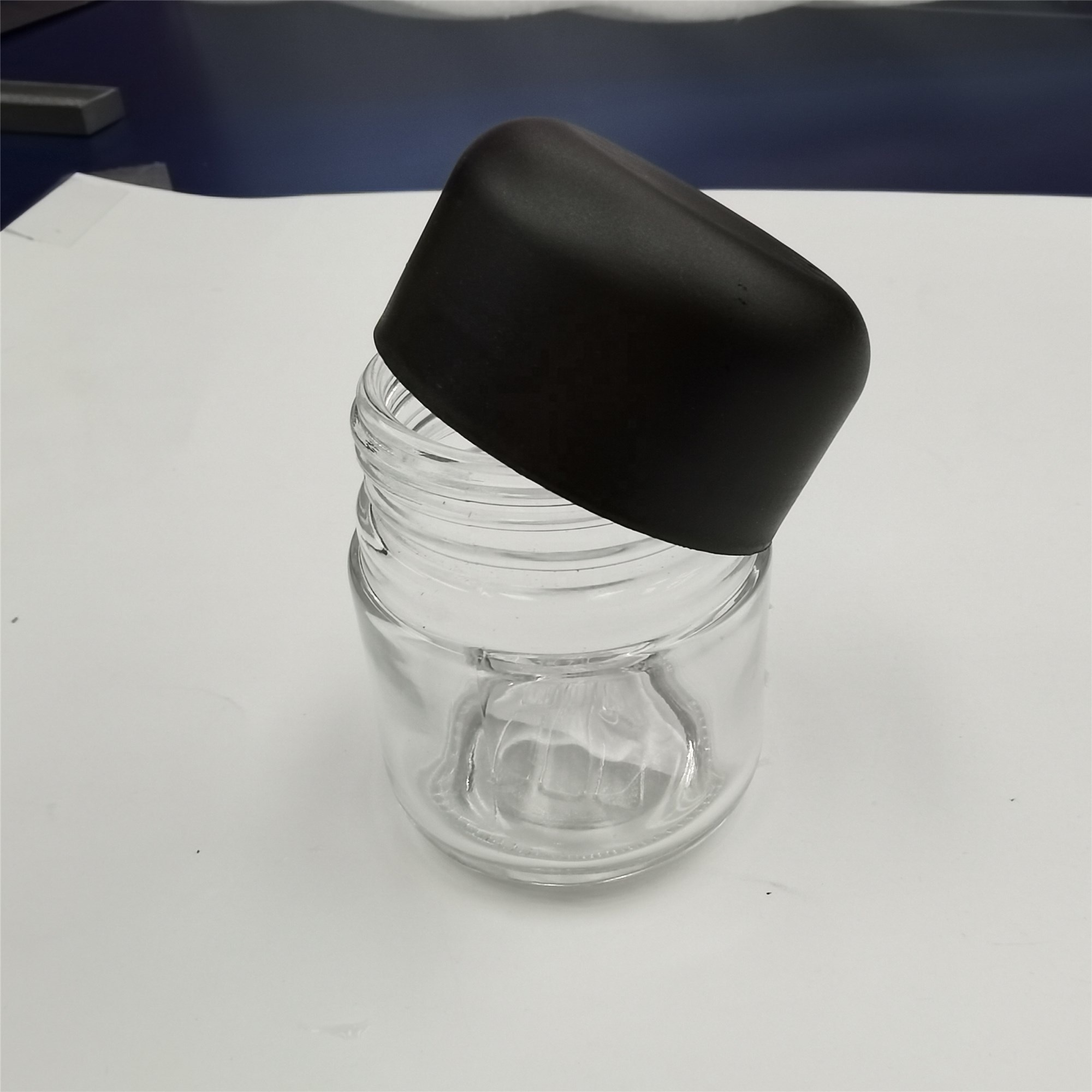 3OZ childproof glass jar with child resistant cap for packaging weed flowers