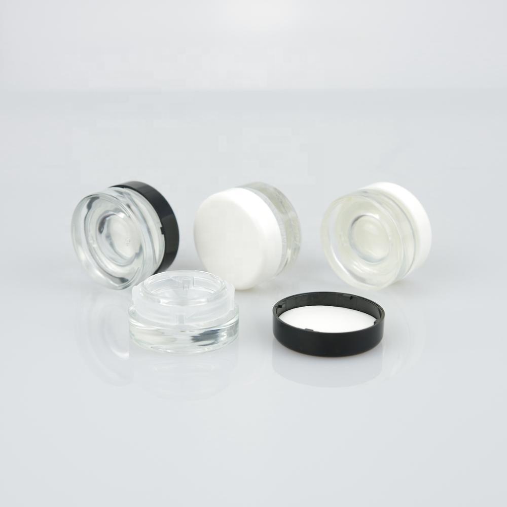 3g 5g small glass cosmetic jar with plastic childproof cap for cream