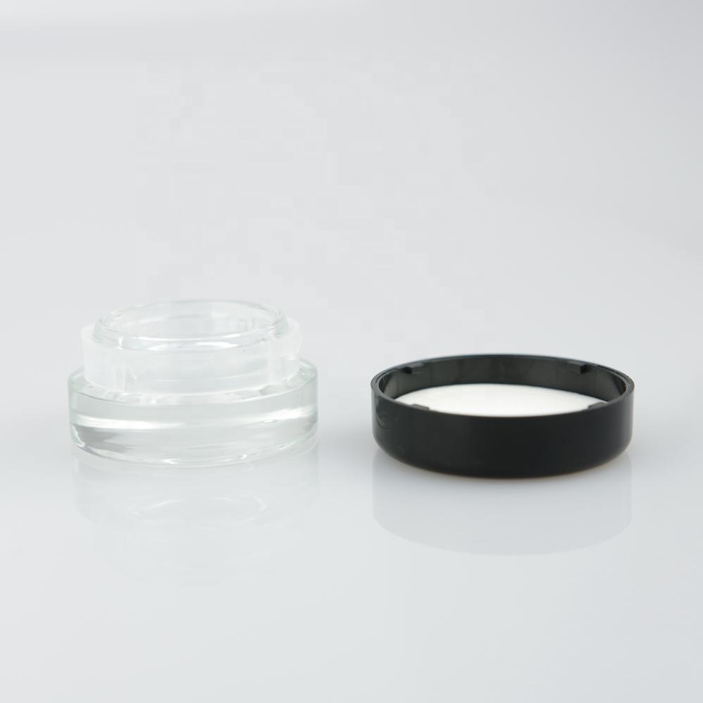 3g 5g small glass cosmetic jar with plastic childproof cap for cream