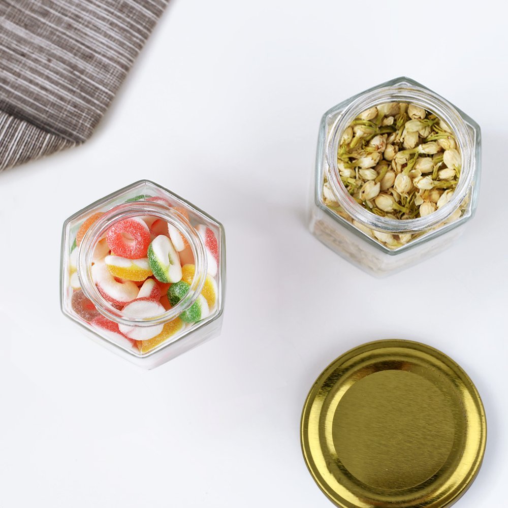 4 oz hexagon honey mini glass jar with gold metal screw lid