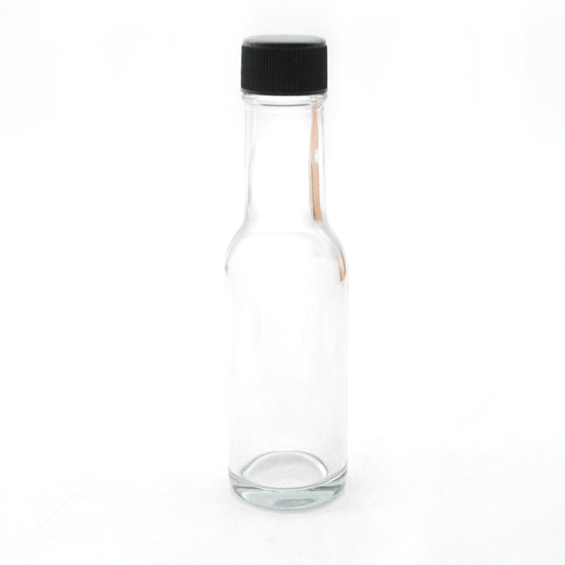 5 oz. Clear Glass Hot Sauce Bottle (woozy) with Black Cap + Shrink band and Orifice Reducer