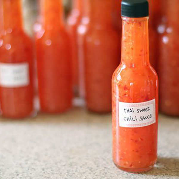 5 oz woozy tomato glass bottle for sauce storage