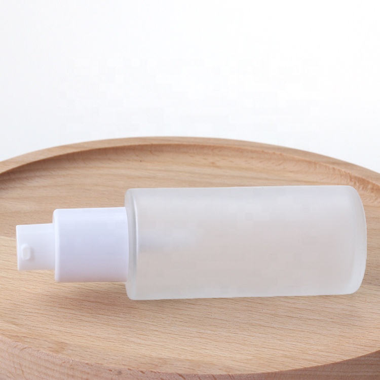 50 ml frosted white glass bottles cosmetic packaging face cream pump and fine mist spray bottle with water transfer wooden lid
