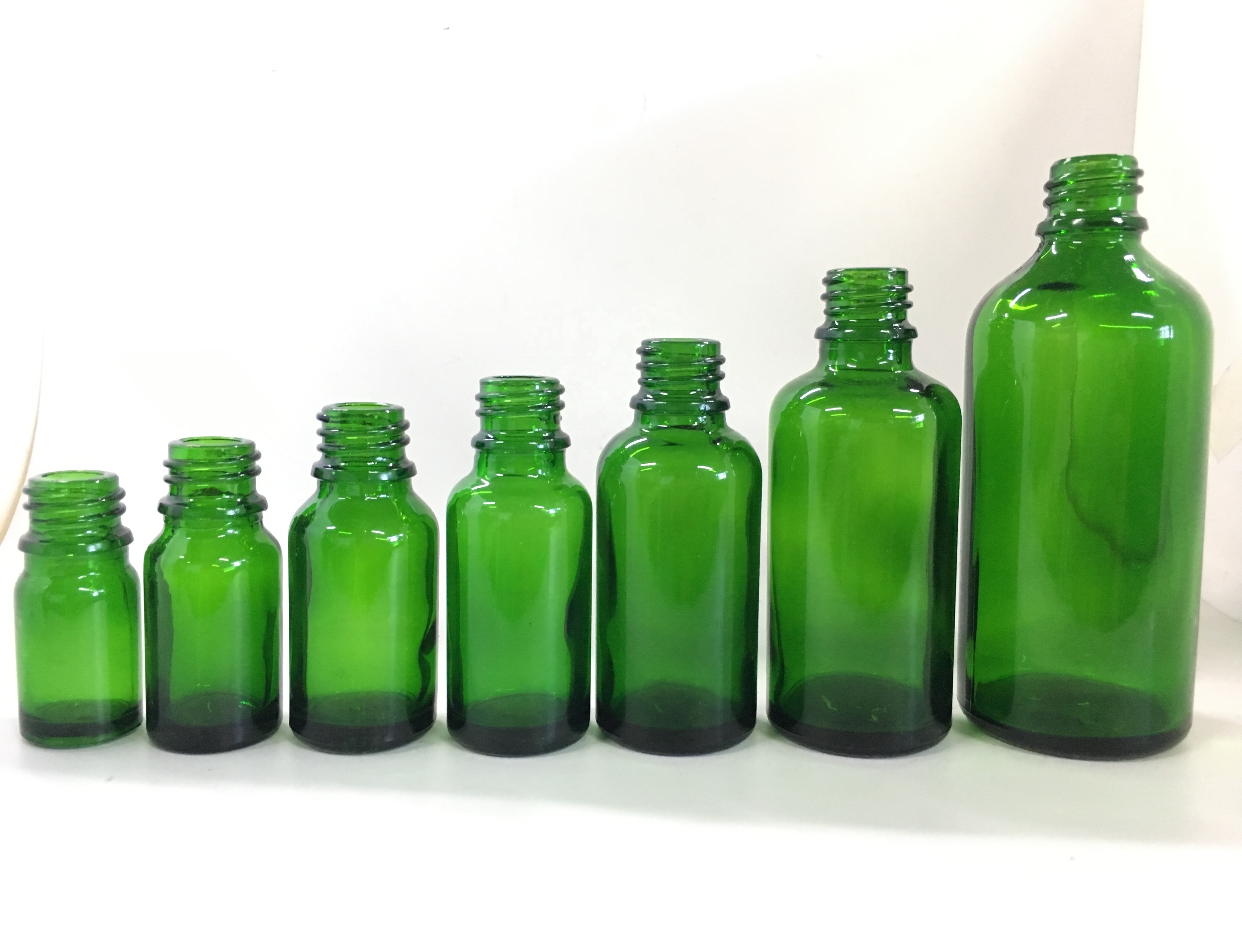 50 ml green essential oil glass bottle with tamper proof cap and orifice reducer