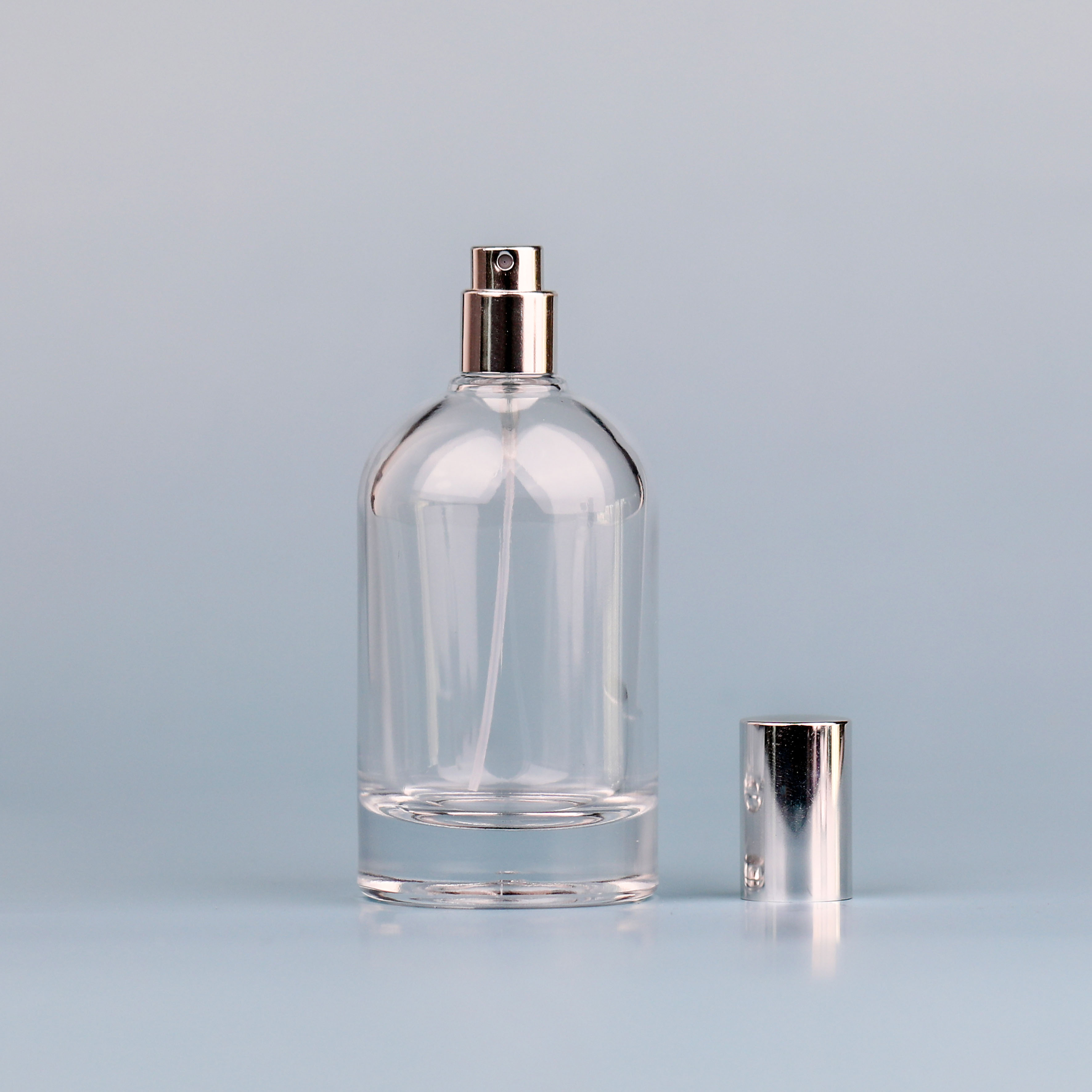 50Ml 100Ml Luxury Beautiful Round Shape Empty Spray Perfume Pump Glass Bottle