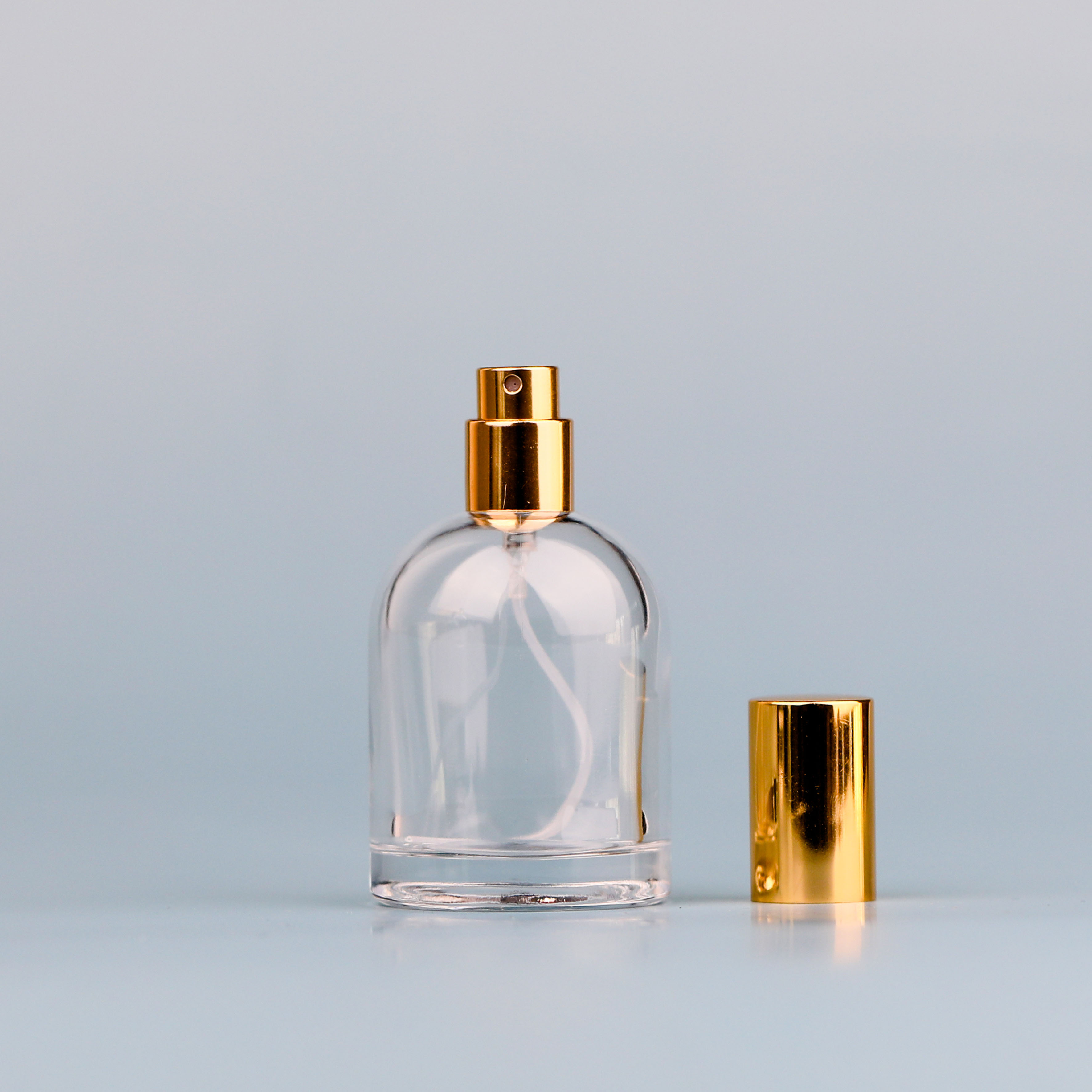 50Ml 100Ml Luxury Beautiful Round Shape Empty Spray Perfume Pump Glass Bottle