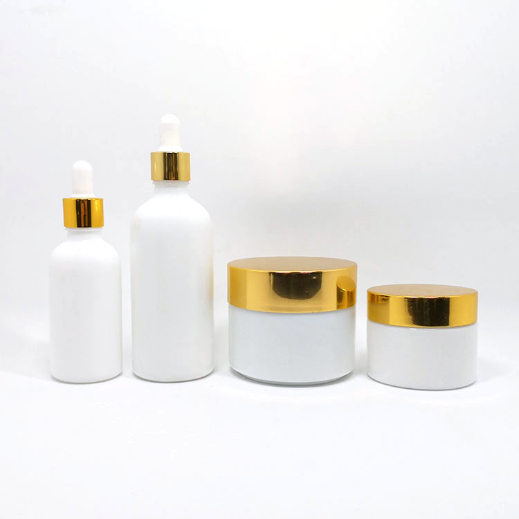 50g 100g opal white cosmetic ceramic glass jar and bottle set with gold aluminum lids