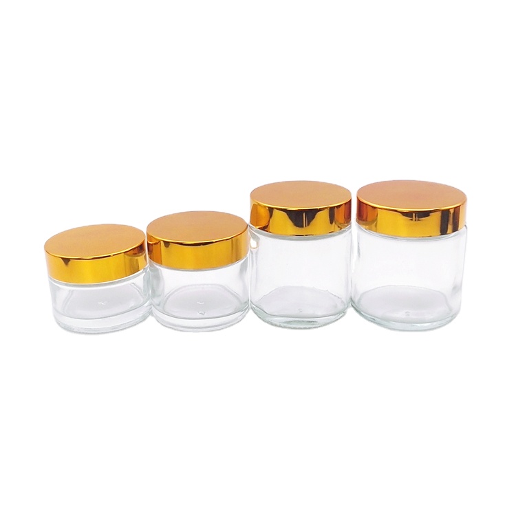 50g 70g 100g 120g clear amber round cosmetic glass face cream jar with golden black plastic cap