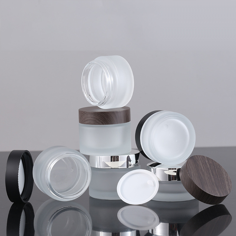 50g thick round cosmetic glass jar with black silver lid
