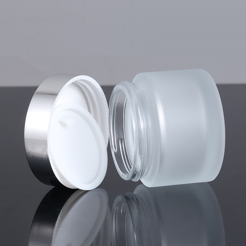 50g thick round cosmetic glass jar with black silver lid