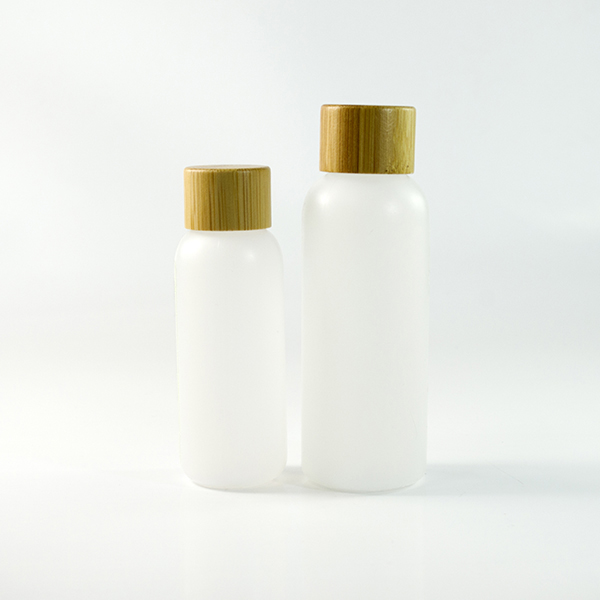 50ml 100ml 120ml 150ml bamboo cosmetic packaging PET plastic bottle with bamboo pump sprayer lotion cap