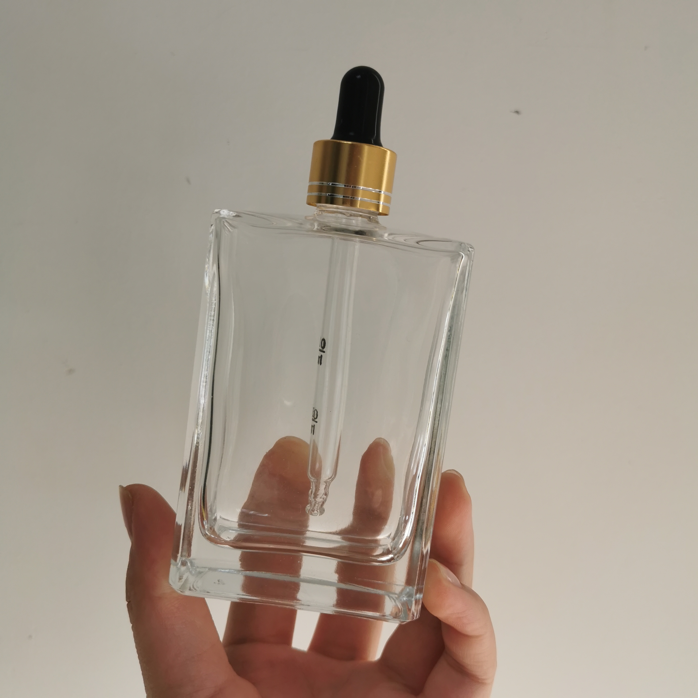 50ml 100ml 150ml Glass Cosmetic Essential Oil Bottle With Pump Dropper