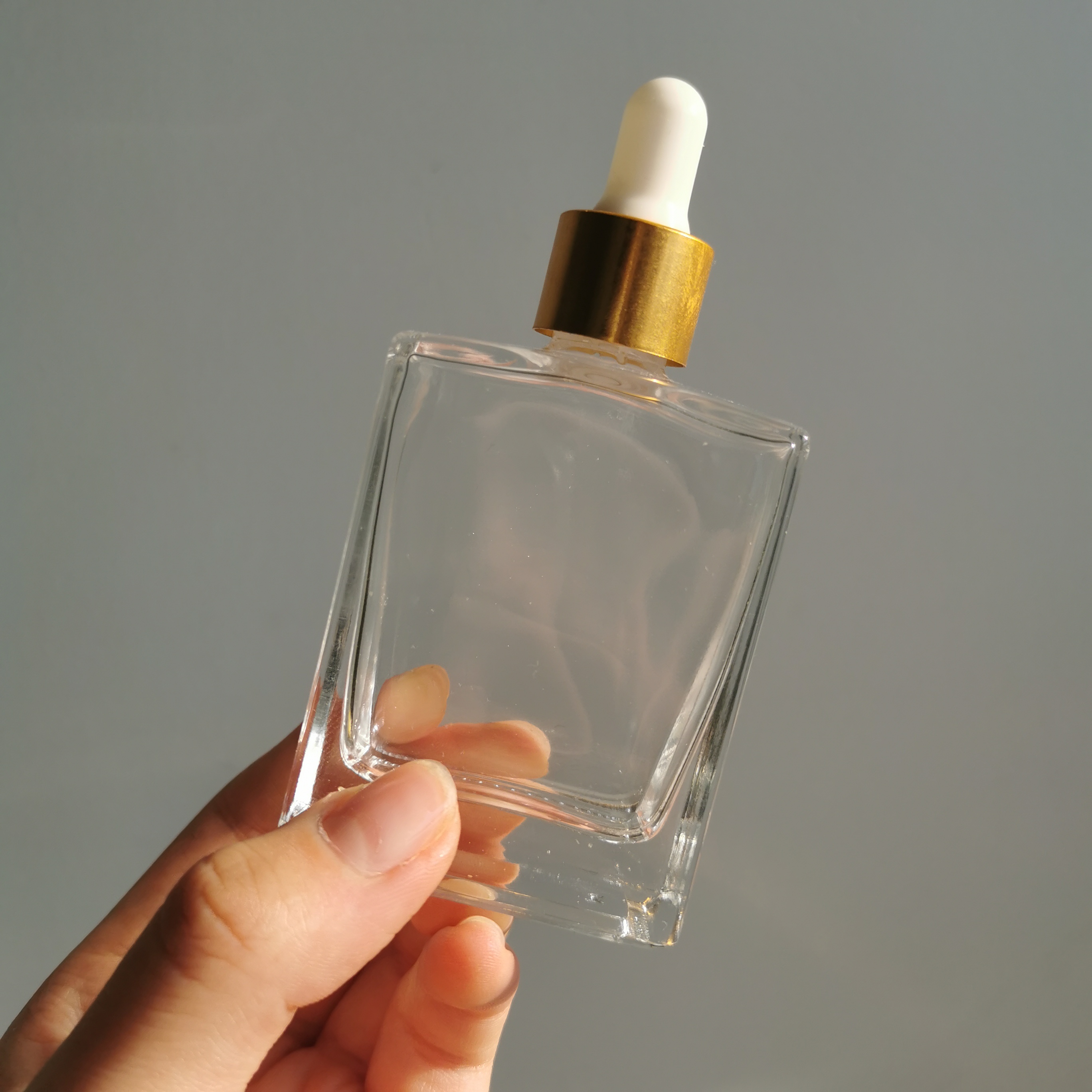50ml 100ml 150ml Glass Cosmetic Essential Oil Bottle With Pump Dropper