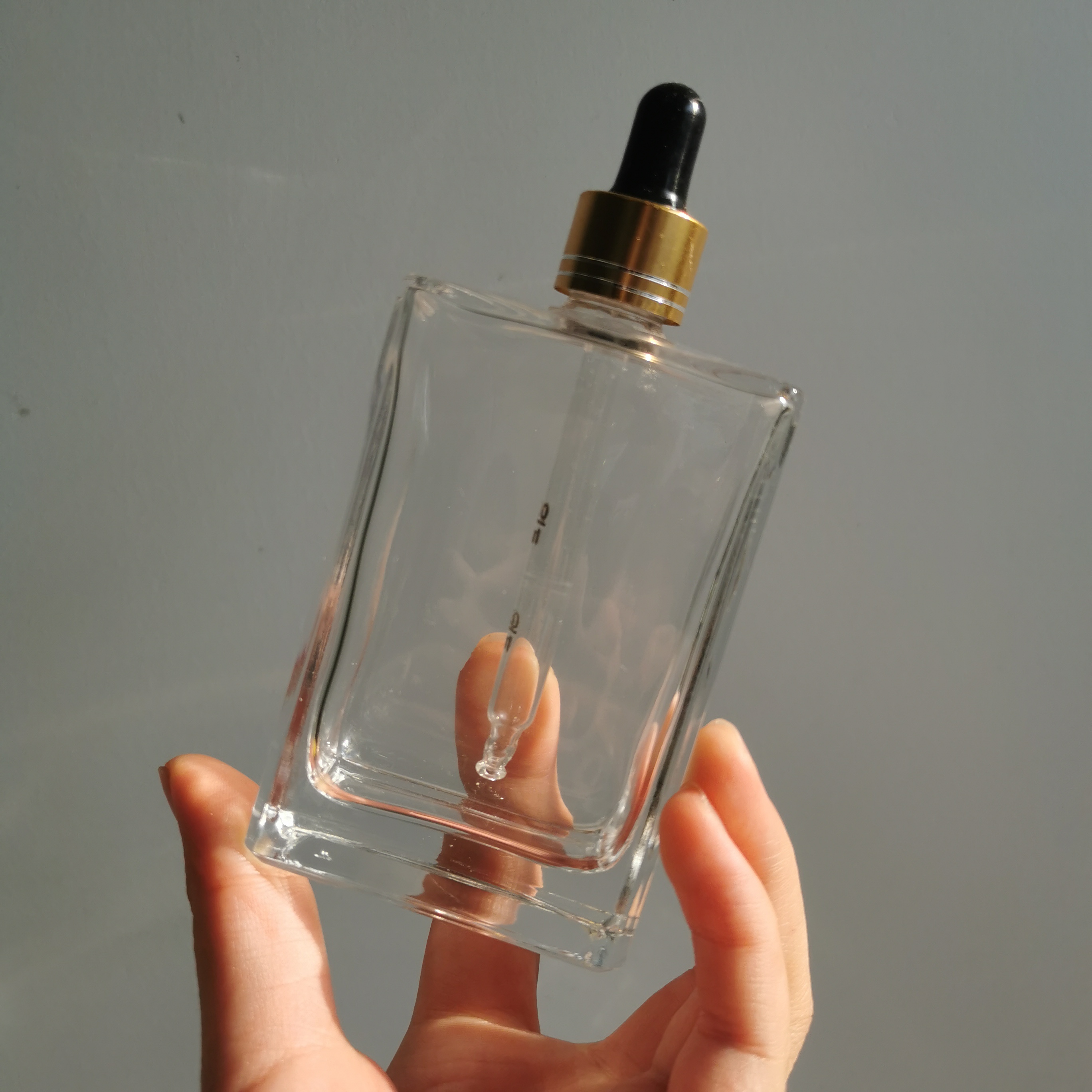 50ml 100ml 150ml Glass Cosmetic Essential Oil Bottle With Pump Dropper