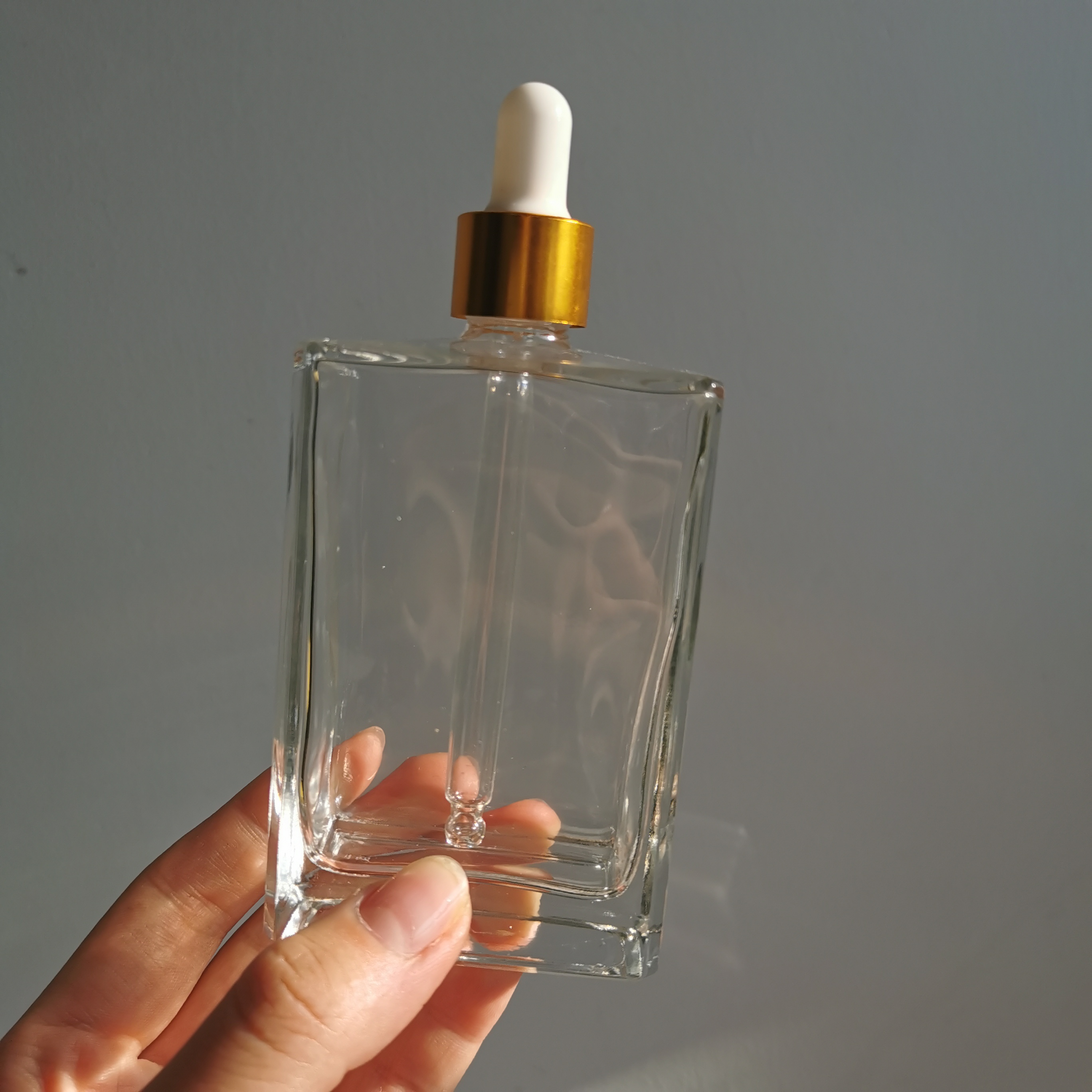 50ml 100ml 150ml Glass Cosmetic Essential Oil Bottle With Pump Dropper